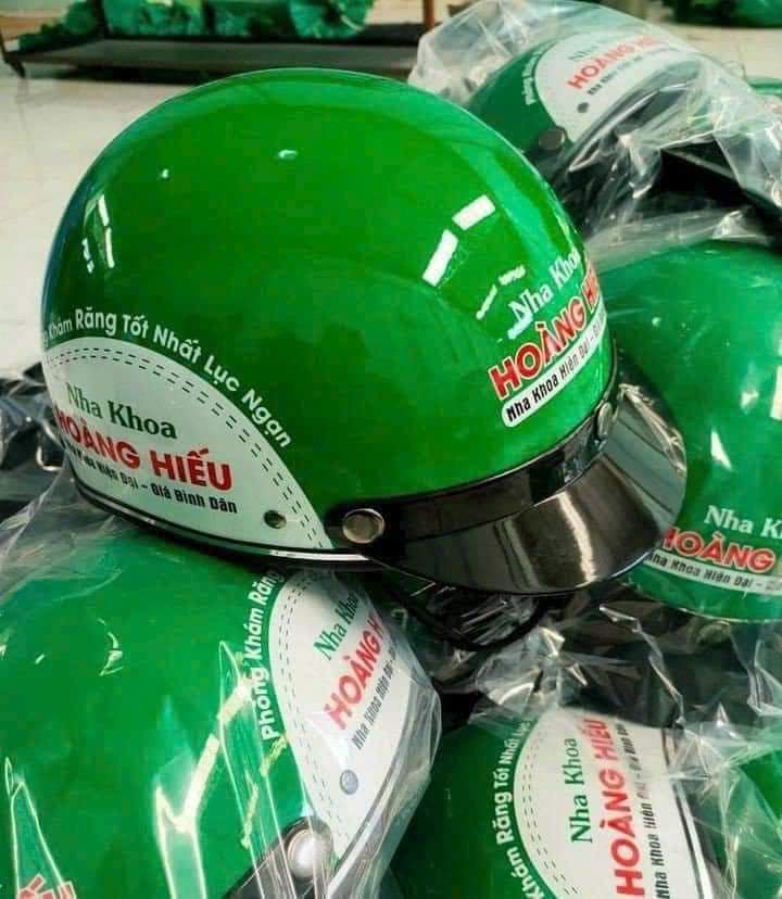 Công ty in nón bảo hiểm theo yêu cầu nha khoa Hoàng Hiếu