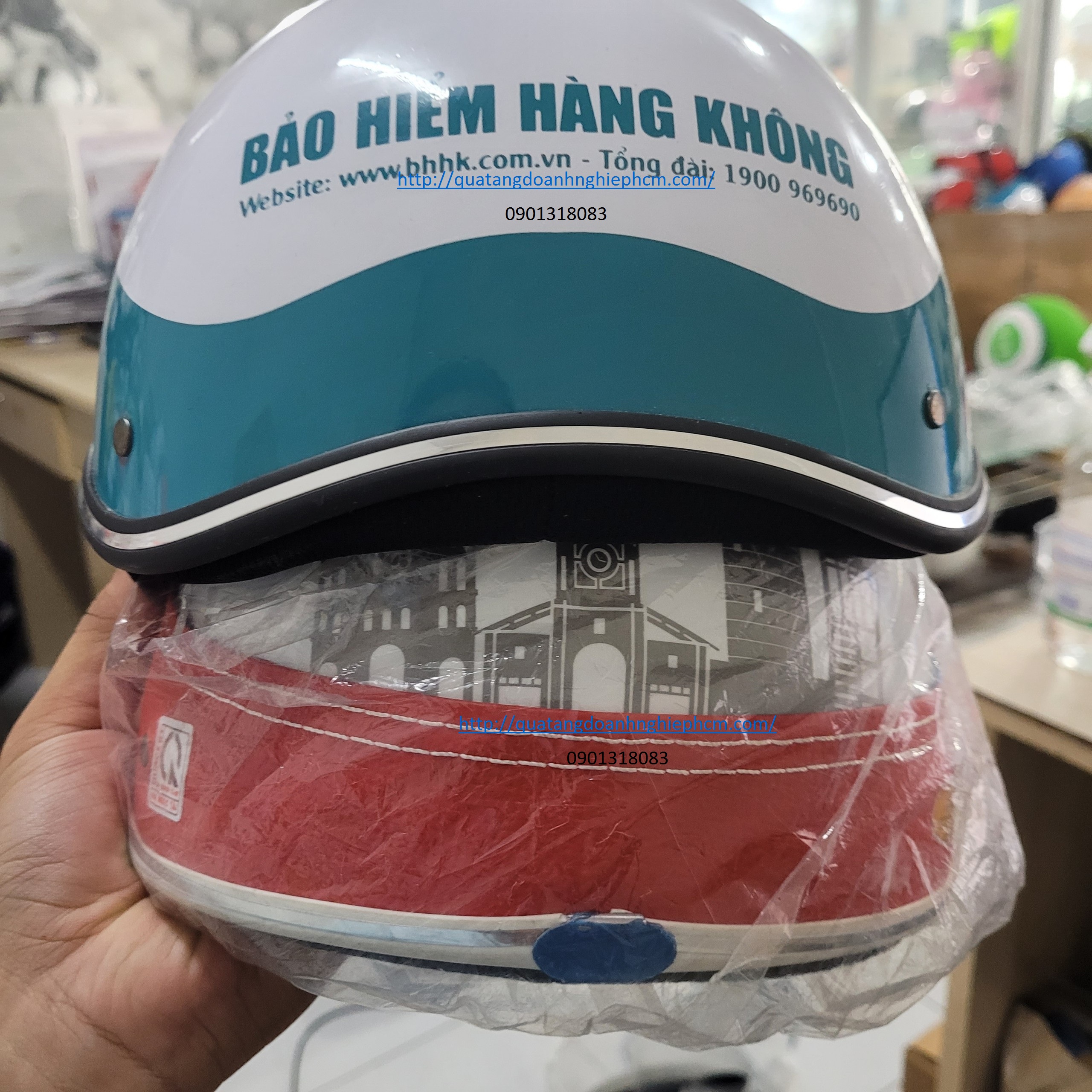 công ty in logo nón bảo hiểm theo yêu cầu 1