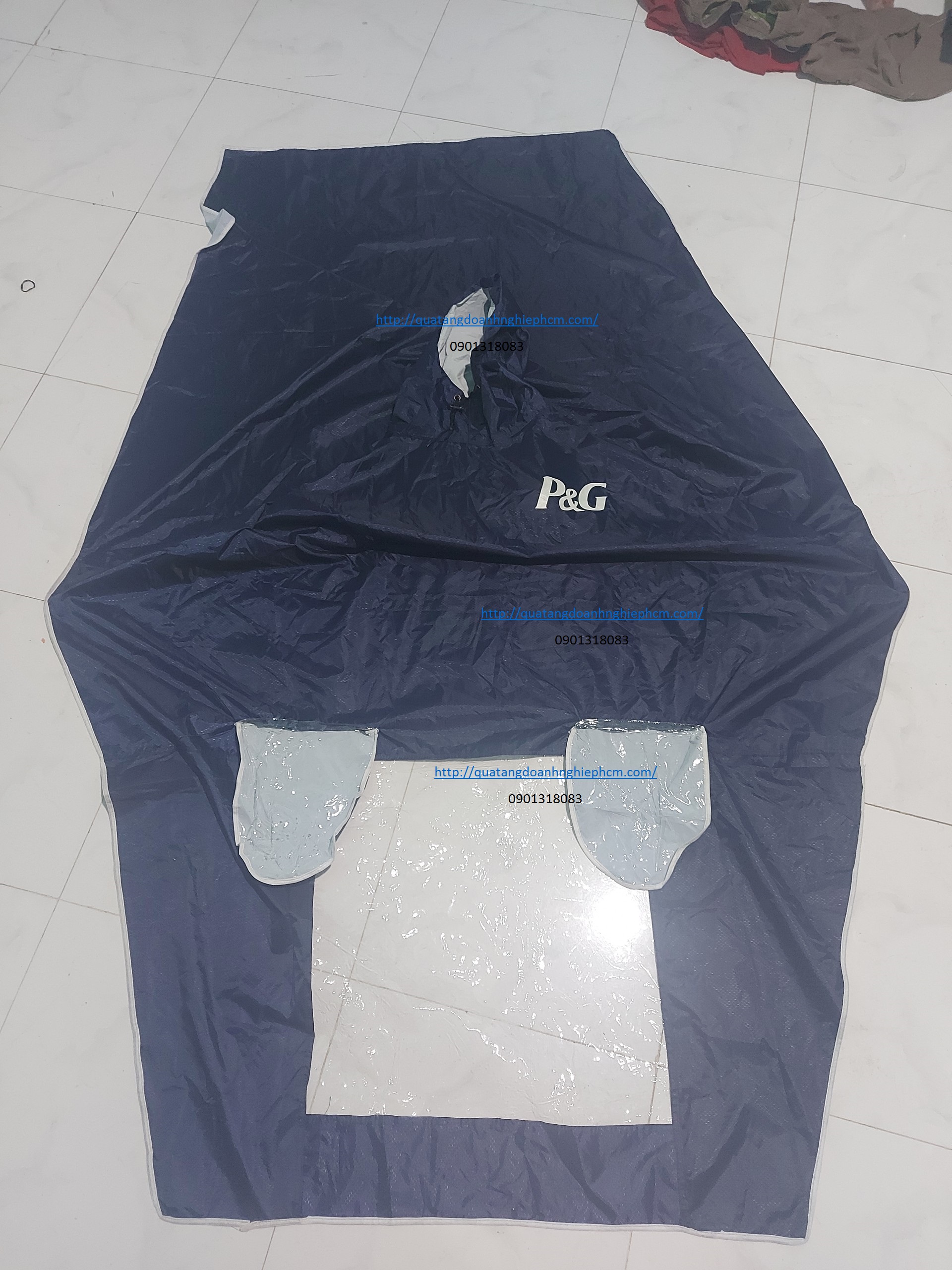 áo mưa quà tặng kiểu tai thỏ của công ty PG